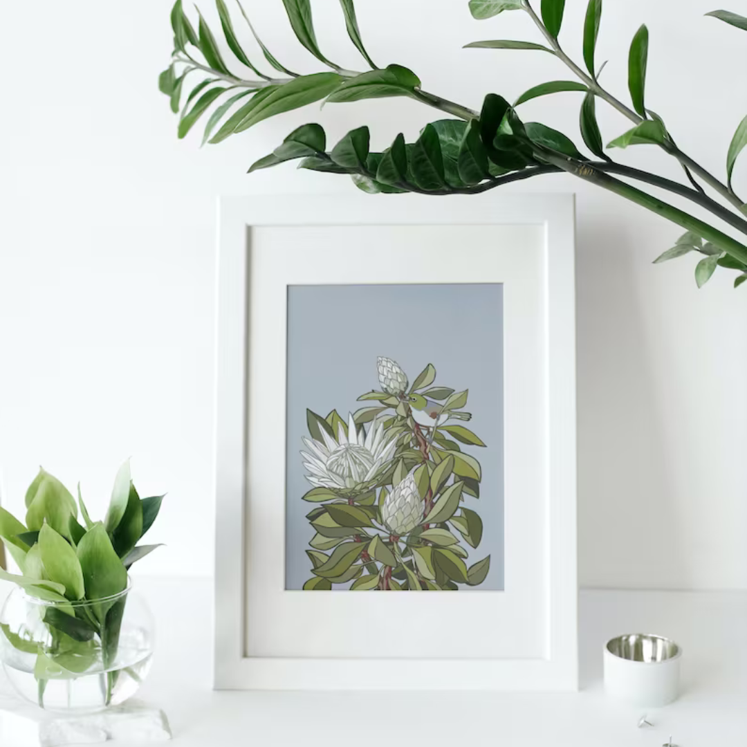 Digital print art by Bridget King featuring a Tahou bird amongst white Protea flowers.