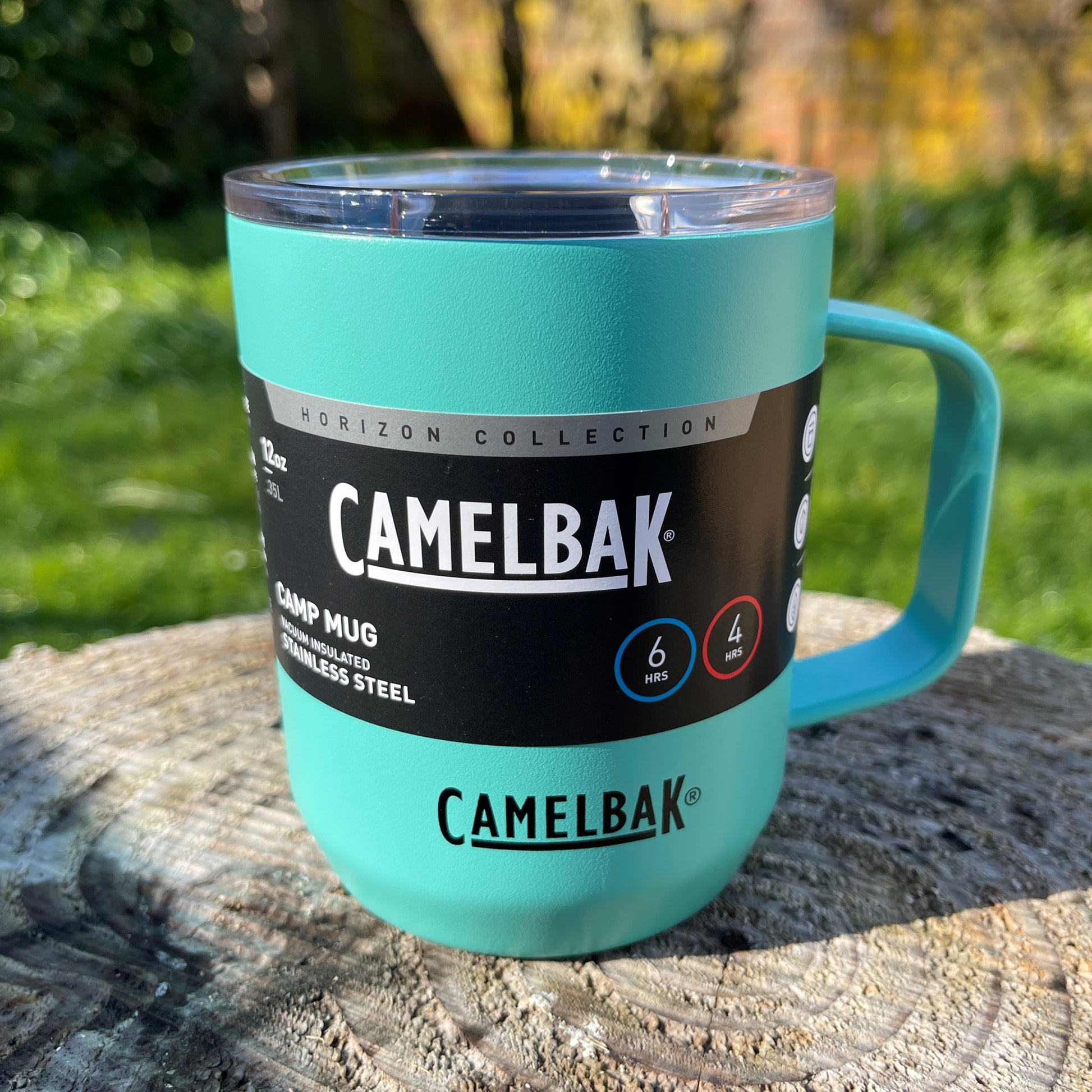Camelbak Coastal blue stainless camping mug with lid and handle.