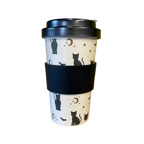 Travel coffee cup with black cats, bats and stars printed on it.