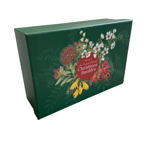 Dark green rectangle box. On the lid is a spray of native NZ flowers with the words Set of 6 New Zealand Botanical Christmas Baubles.
