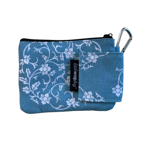 Blue coloured purse with white floral print and carabiner clip.