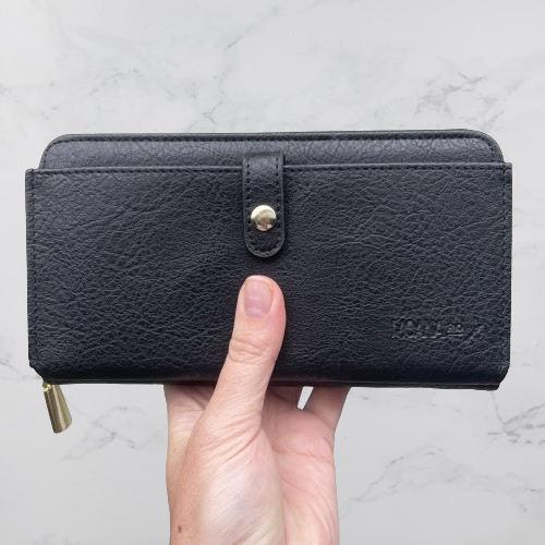 Black wallet by Moana Road.