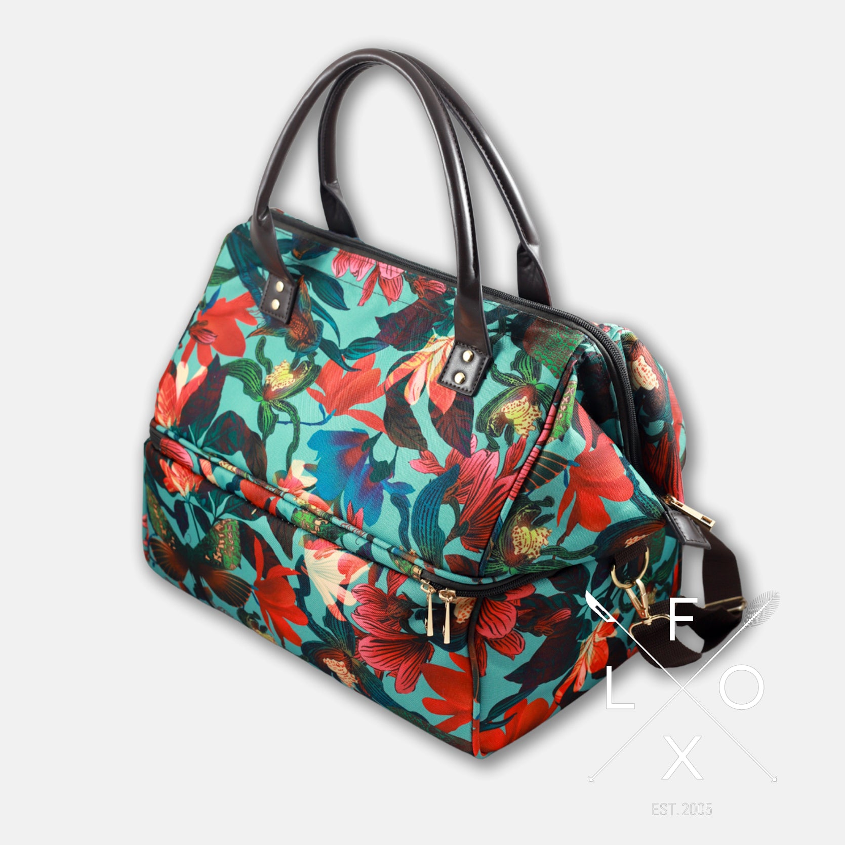 Colourful picnic cooler bag with teal blue background and magnolia flower print.