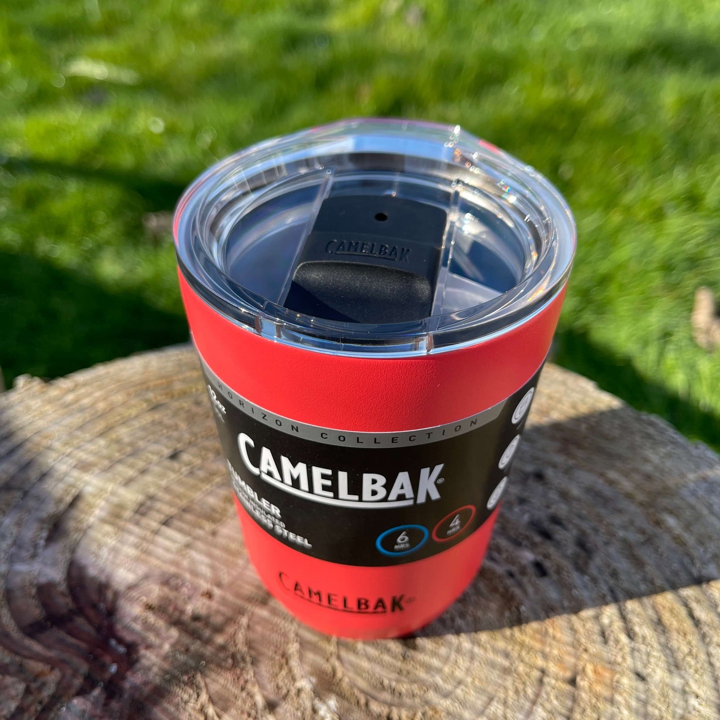 Stainless steel coffee tumbler from Camelbak in a strawberry red colour.