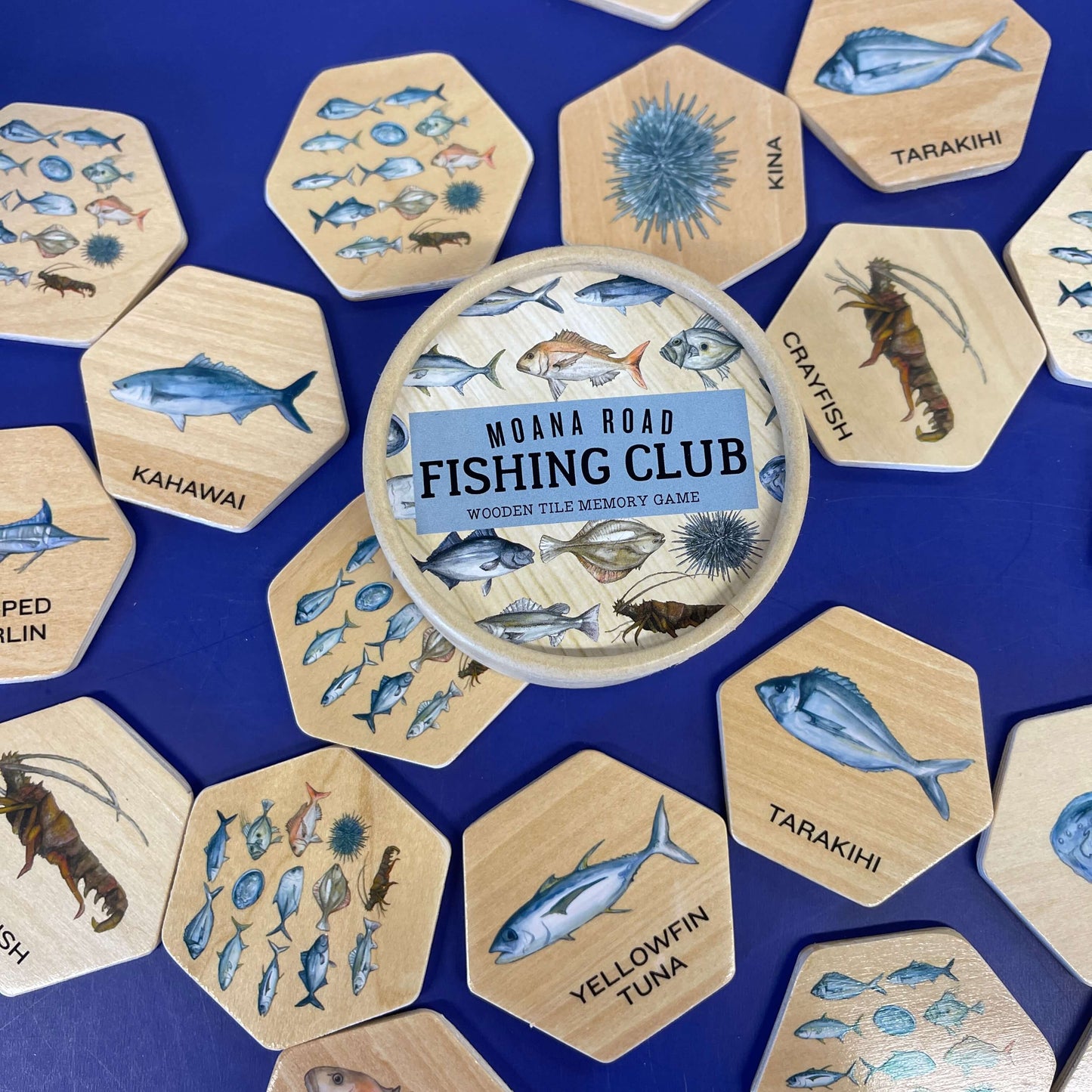 Wooden memory game pieces featuring fish of New Zealand.