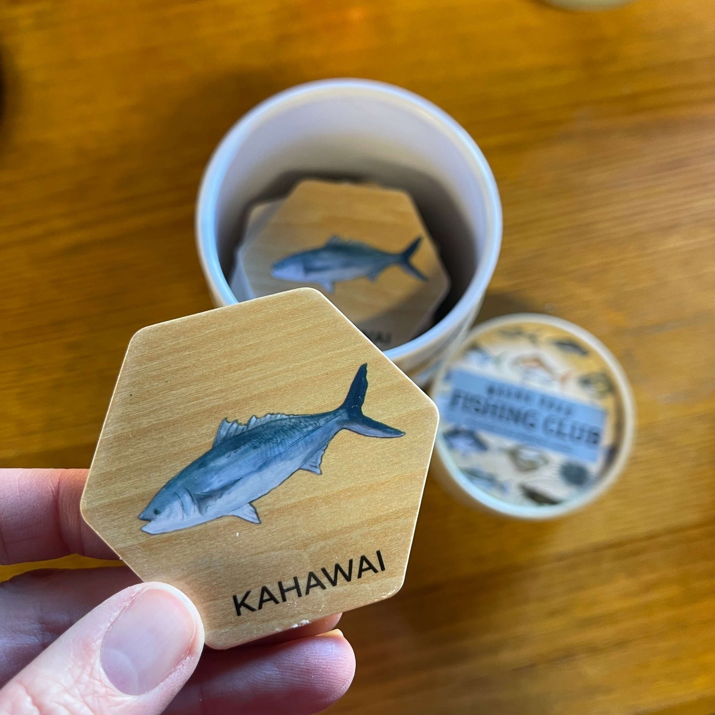 Wooden memory game pieces featuring fish of New Zealand.