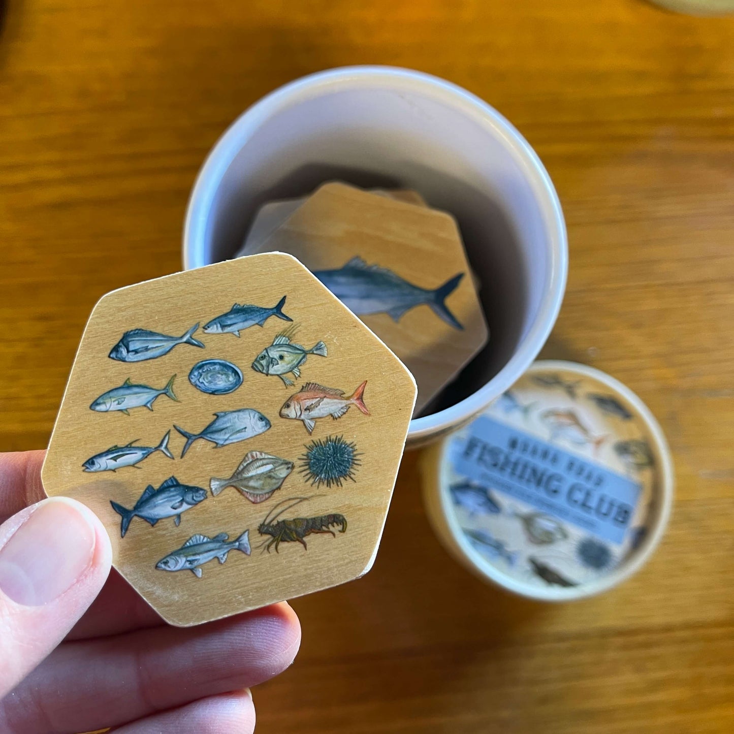 Wooden memory game pieces featuring fish of New Zealand.