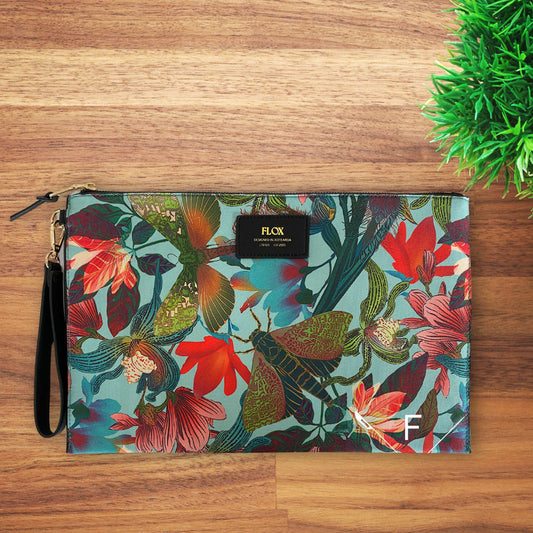 Flox clutch bag with NZ native flying insects and flowers in shades of blue, green, red and pink.