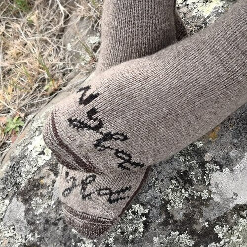 Wyld woolen socks showing the toes with the Wyld logo.