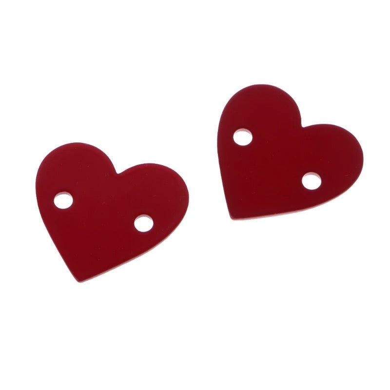 Super cute acrylic shoelace decorations from the school fundraising shop. These are hearts
