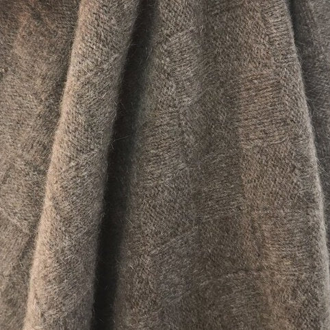 Brown wool knit blanket with basket weave pattern.