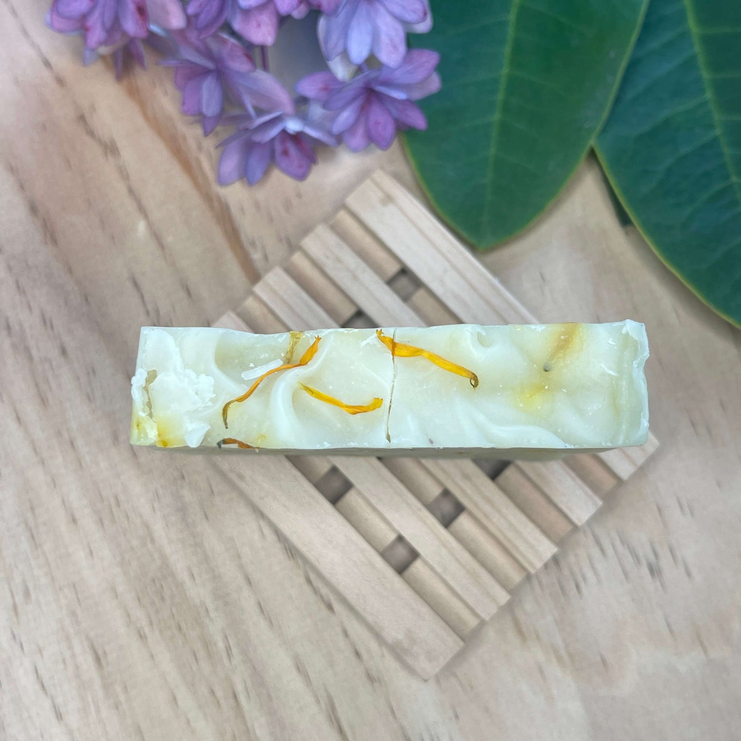 Natural soap on a wooden soap rack.