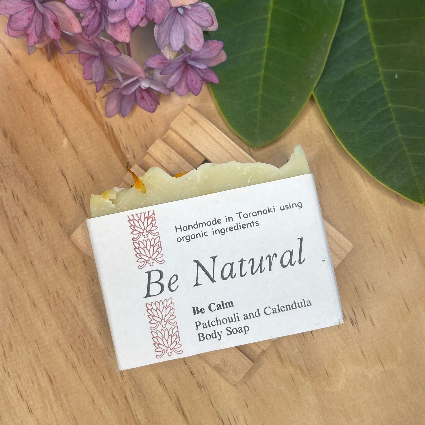 Natural soap on a wooden soap rack.
