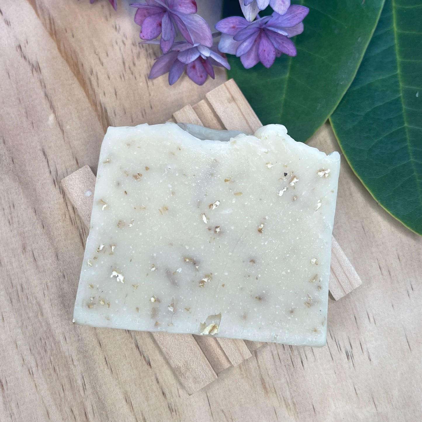 Natural soap on a wooden soap rack.