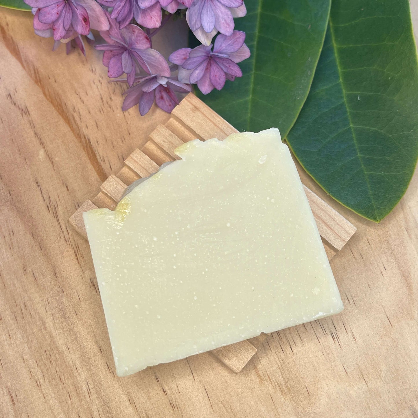 Natural soap on a wooden soap rack.