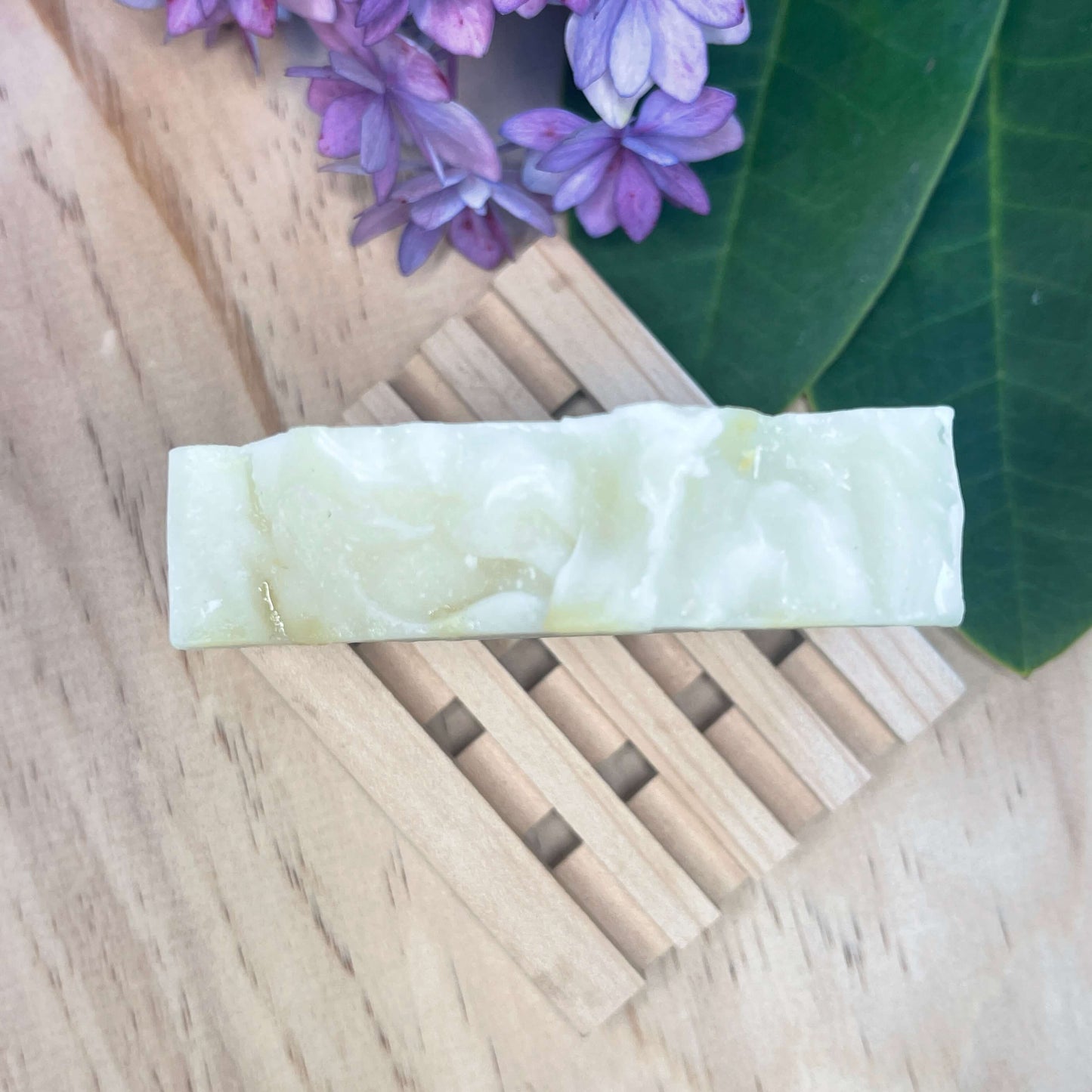 Natural soap on a wooden soap rack.
