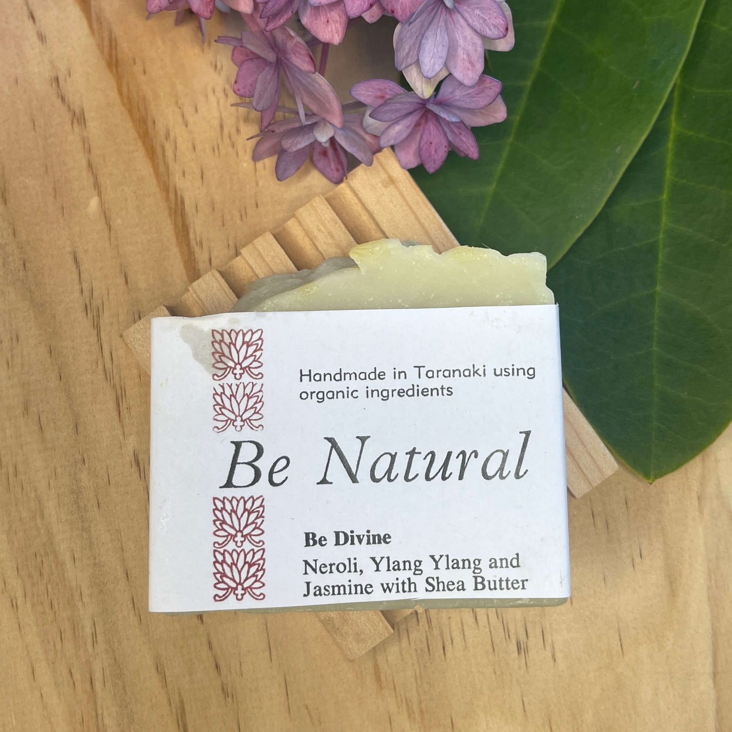 Natural soap on a wooden soap rack.