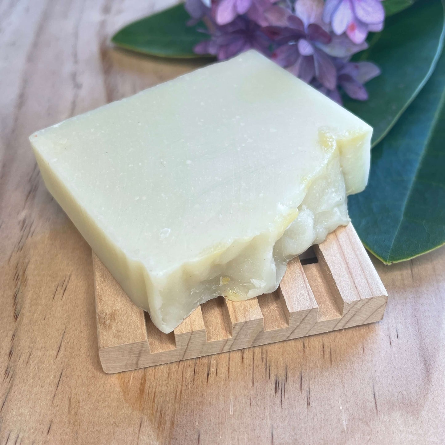 Natural soap on a wooden soap rack.