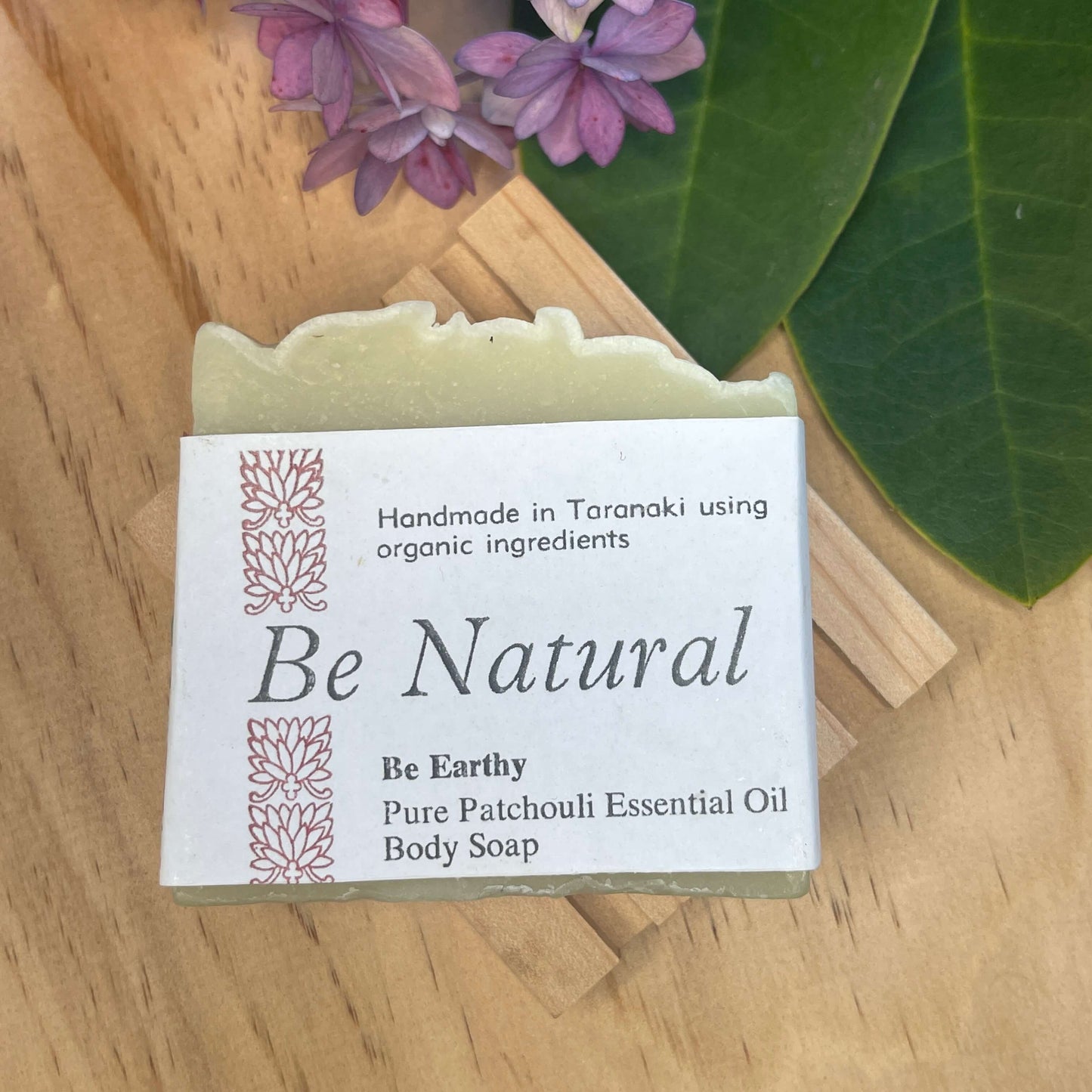 Natural soap on a wooden soap rack.