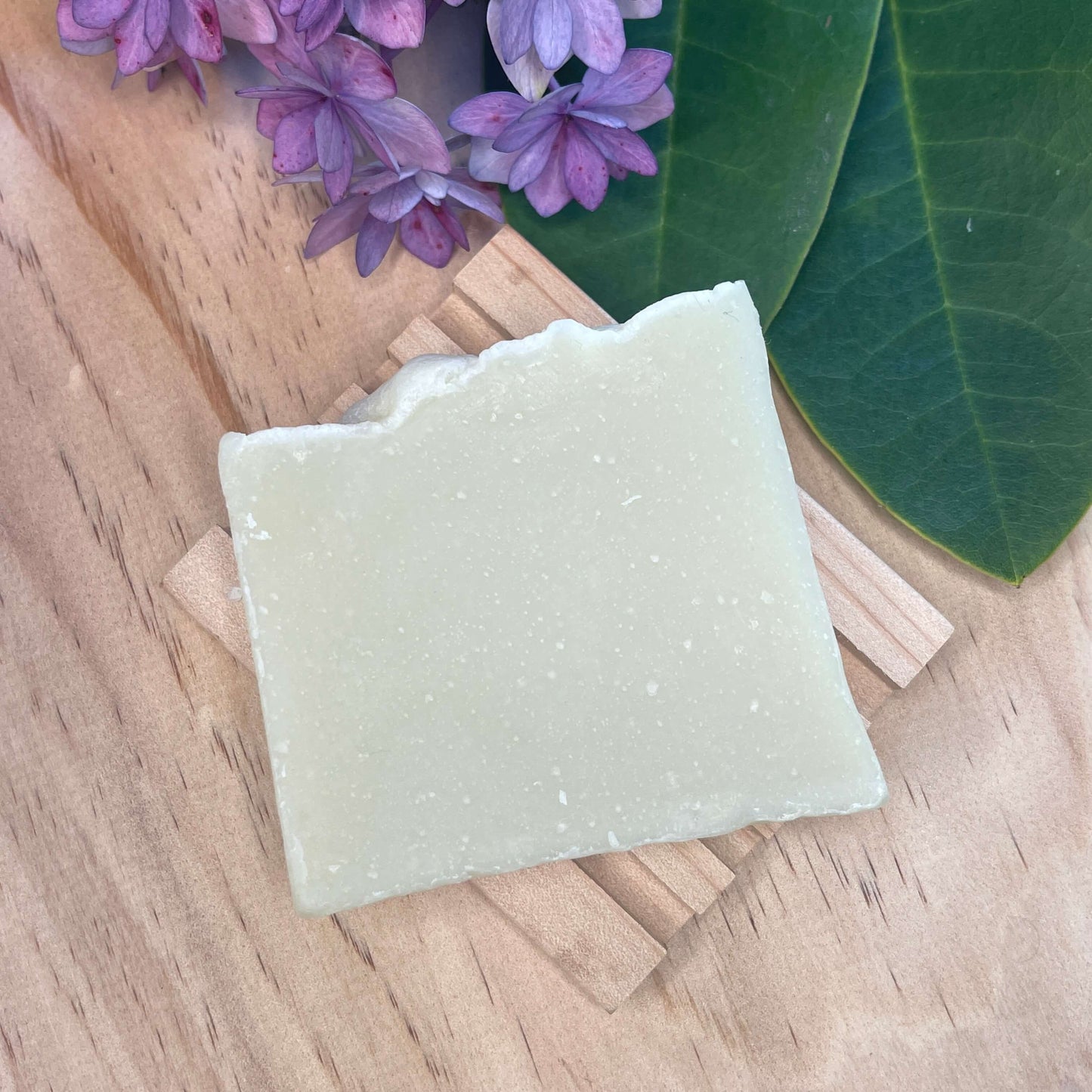 Natural soap on a wooden soap rack.