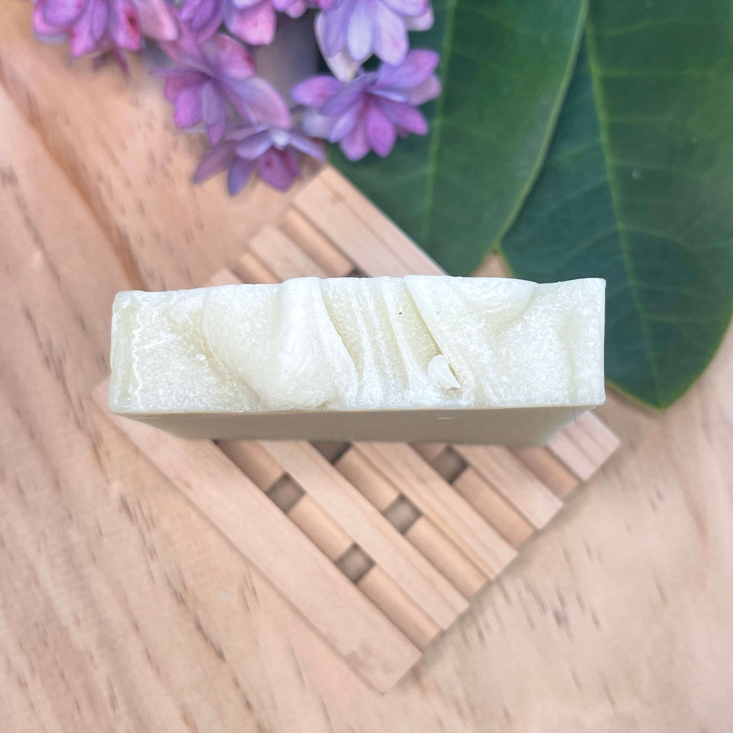 Natural soap on a wooden soap rack.