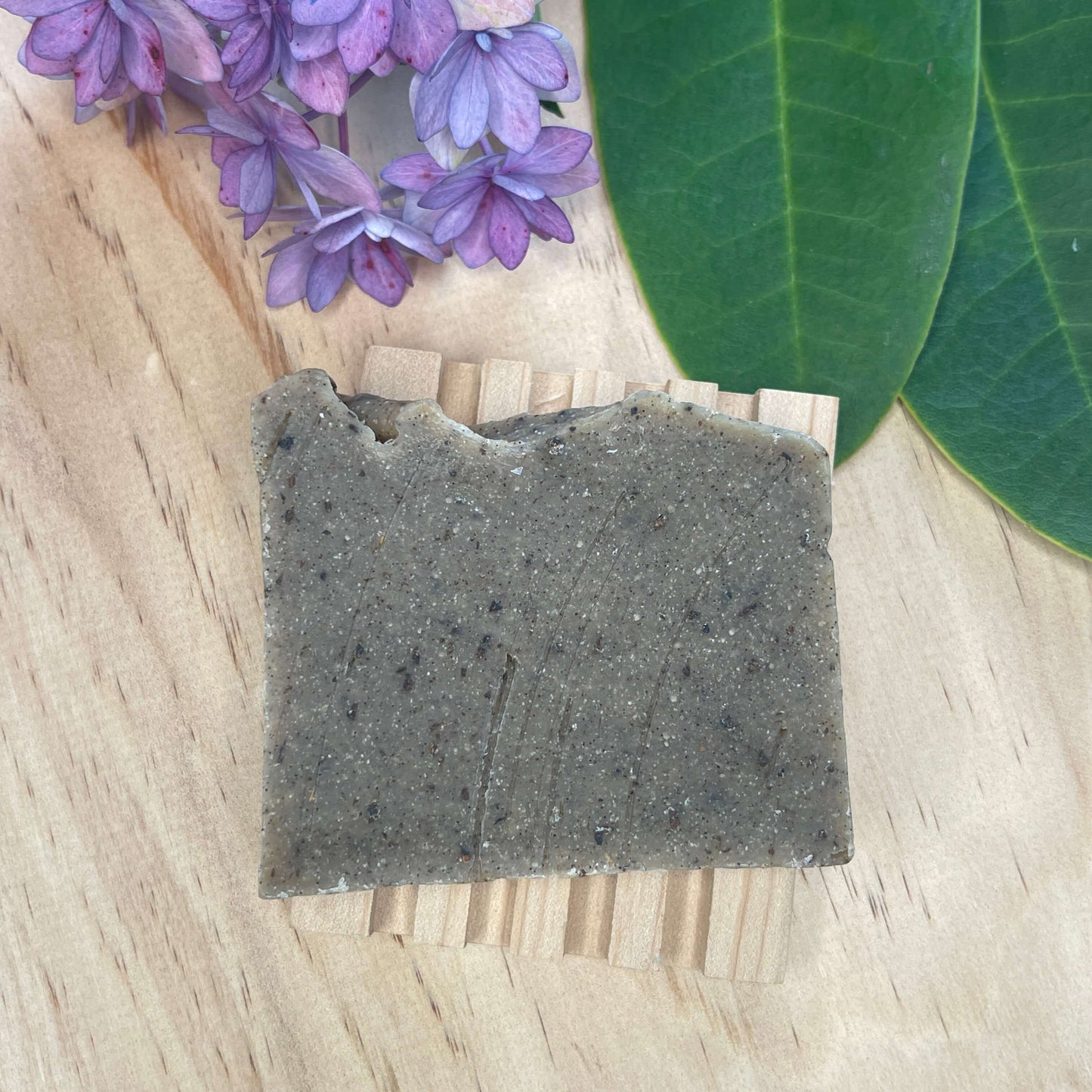 Natural soap on a wooden soap rack.