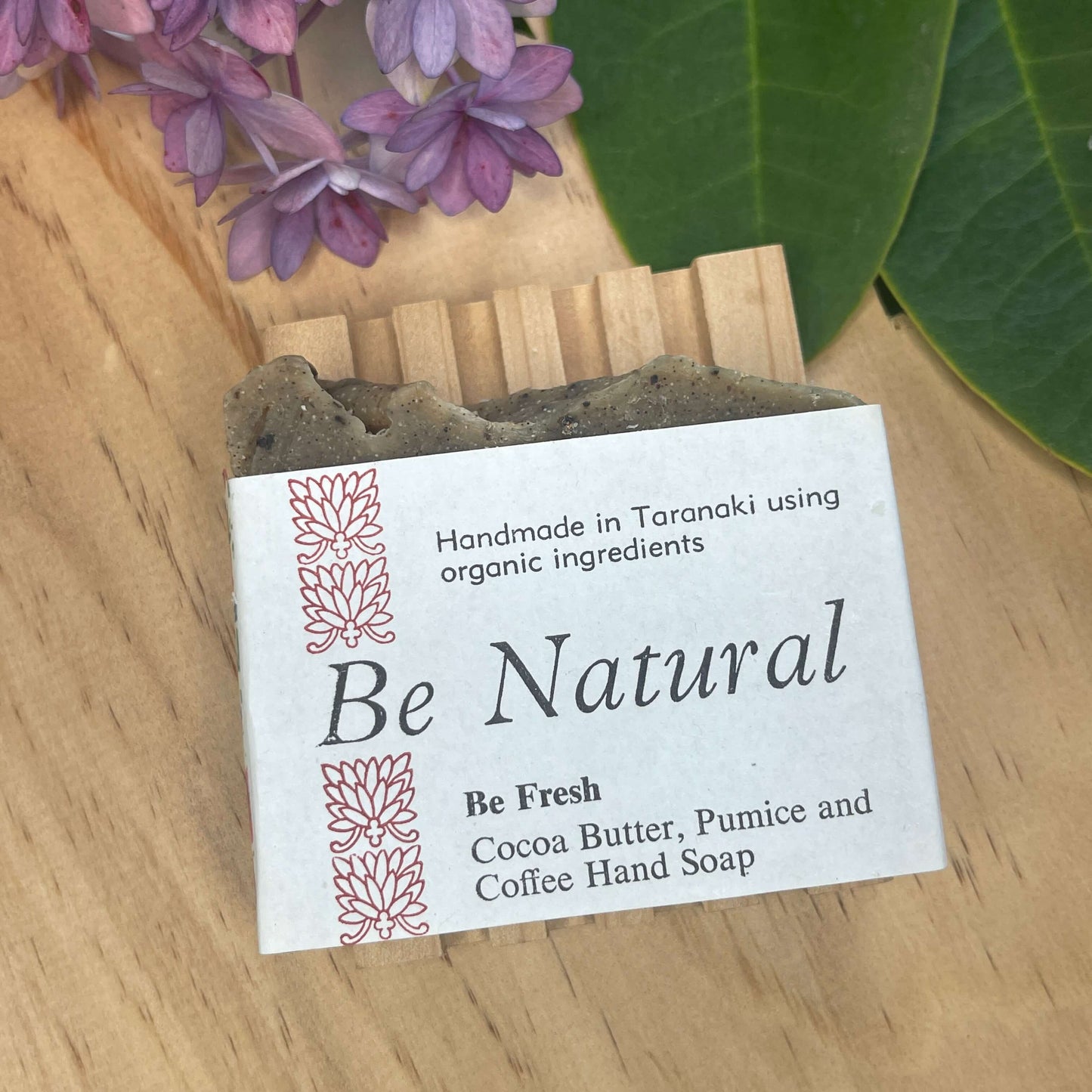 Natural soap on a wooden soap rack.