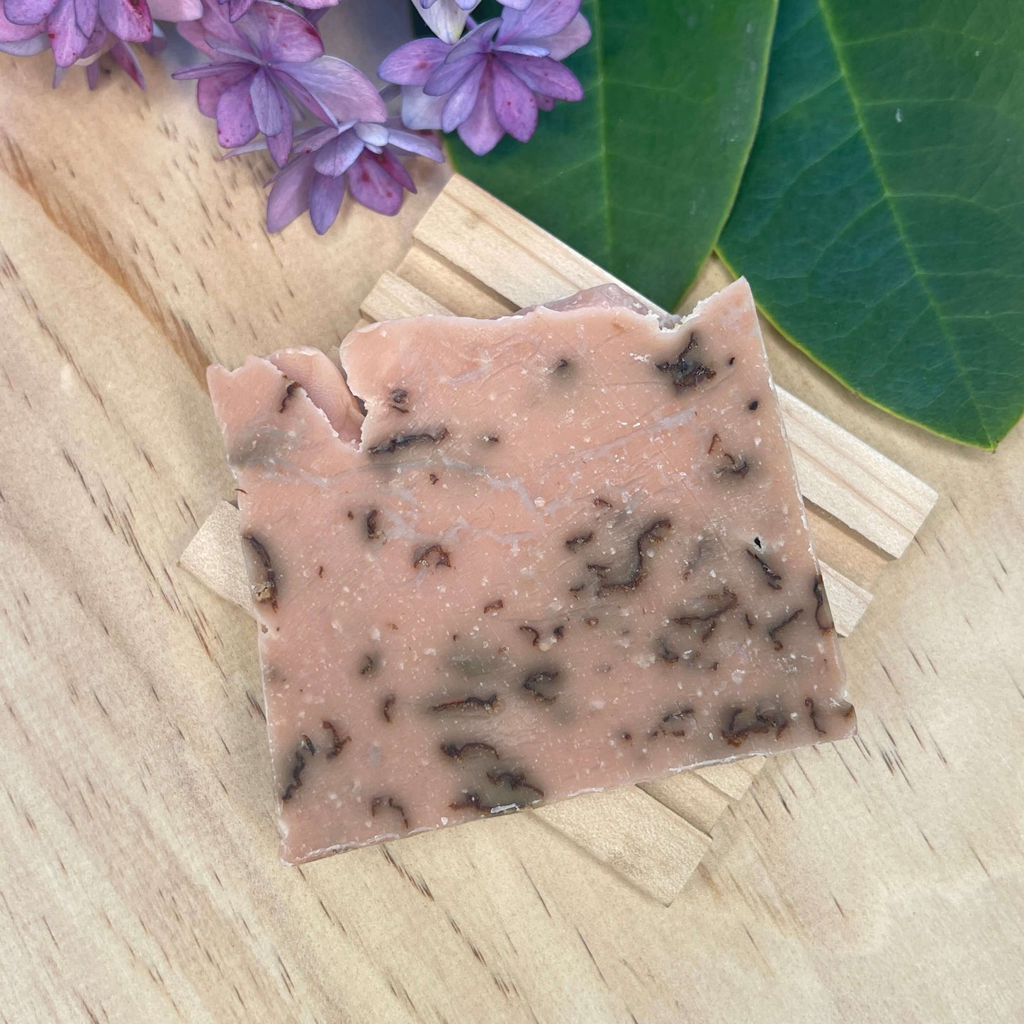 Natural soap on a wooden soap rack.