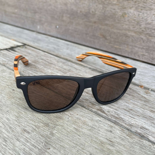 Black frame sunglasses with wooden striped arms.