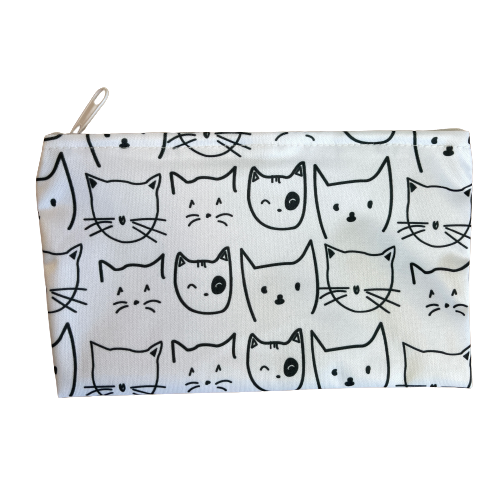 White reusable bag with black cat faces print.