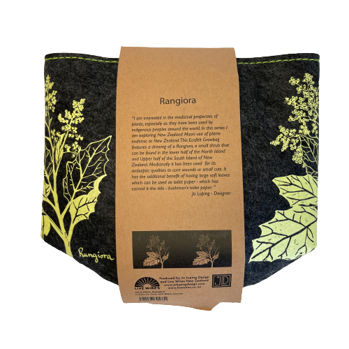 Dark grey felt planter with light green Rangiora flower print and sitting in a grey dish, flat packed and wrapped with kraft paper.
