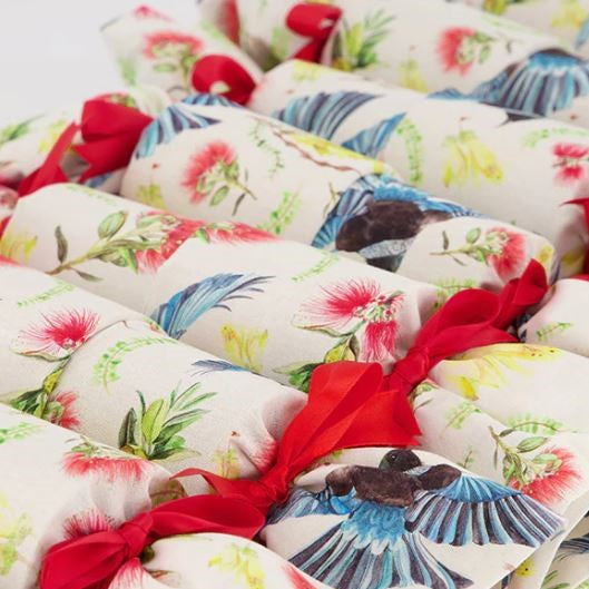 Reusable christmas crackers in a flora fauna print.
