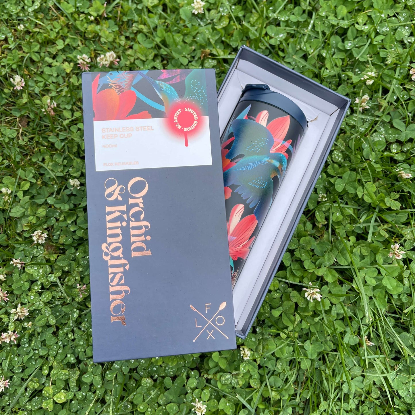 Flox reusable cup in navy blue with Kingfisher and Orchid print in designer gift box.