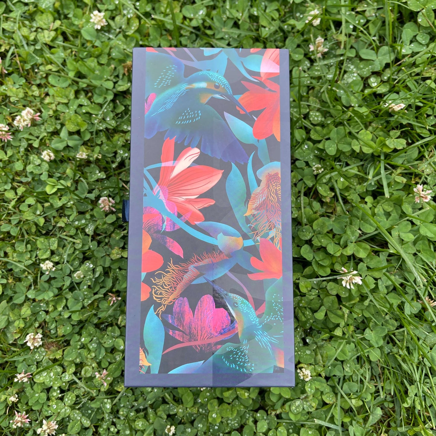 Back of Flox designer gift box with keep cup inside.