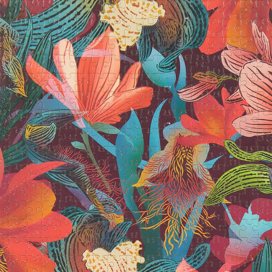 Flox jigsaaw puzzle with magnolia and orchid flowers.