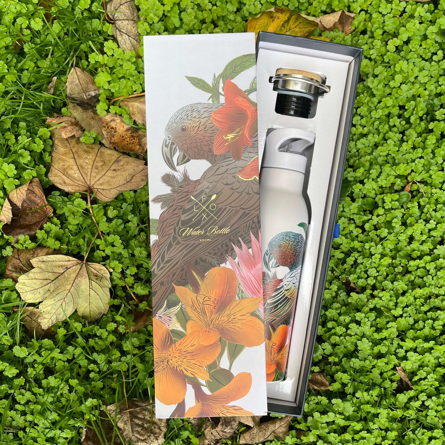 Deluxe water bottle featuring Kaka bird & floral design by artist Flox. Presented in a matching box.
