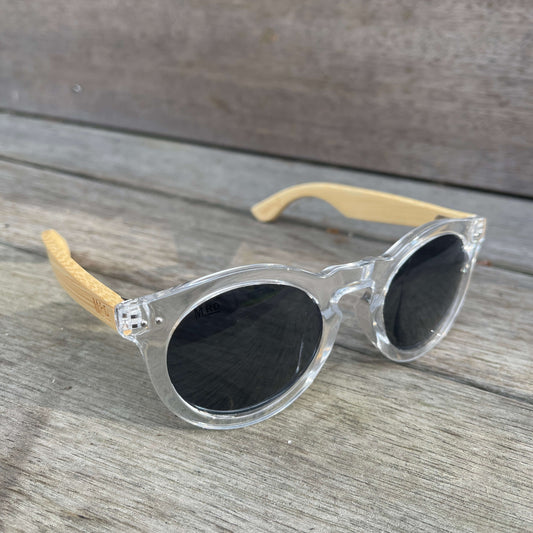 Womens sunglasses with clear frames and bamboo arms in a Grace Kelly style.