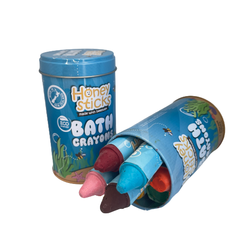 Bath crayons by Honey Sticks in a blue storage tin.