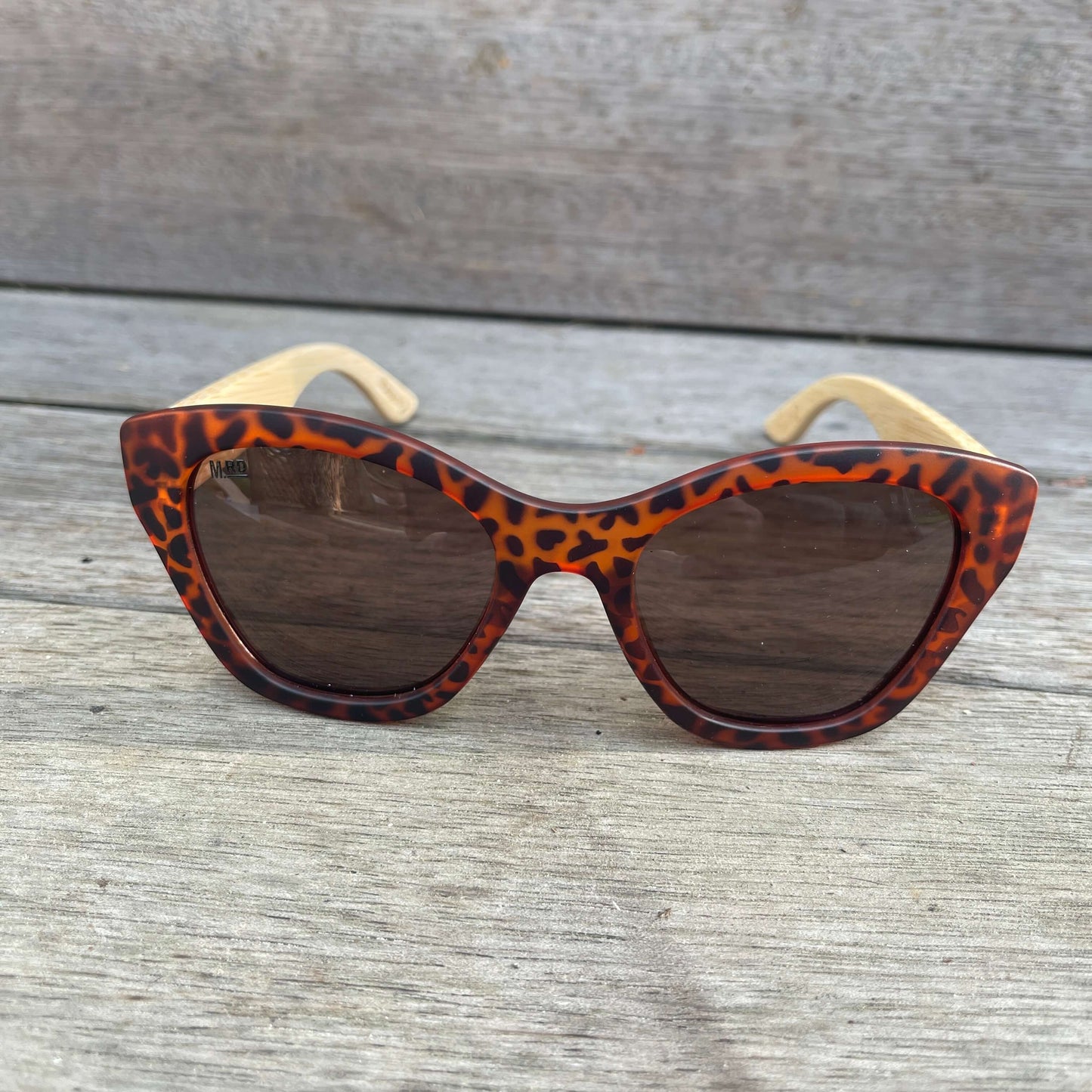 Womens sunglasses with tortoiseshell frame and bamboo arms.
