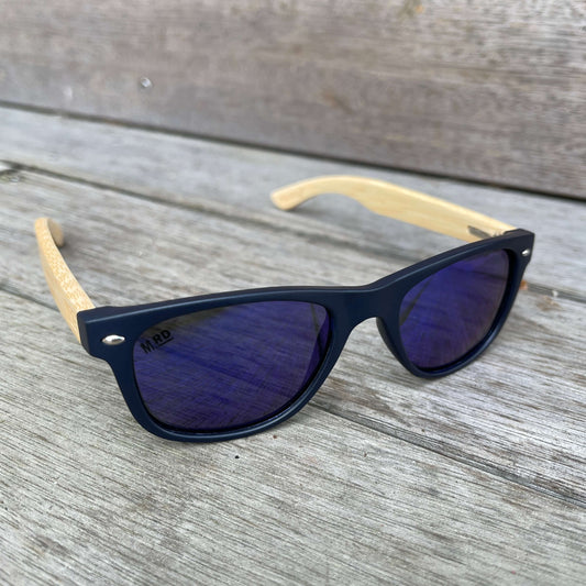 Kids sunglasses with Navy blue frames, blue lenses and wooden arms.