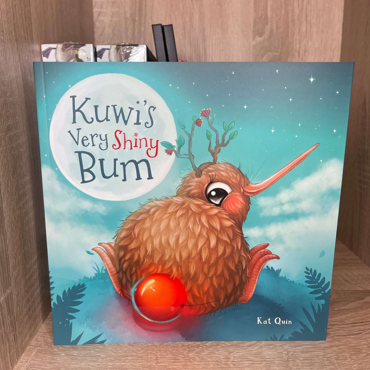 Book cover for childrens book Kuwi's Very Shiny Bum by Kat Quin.