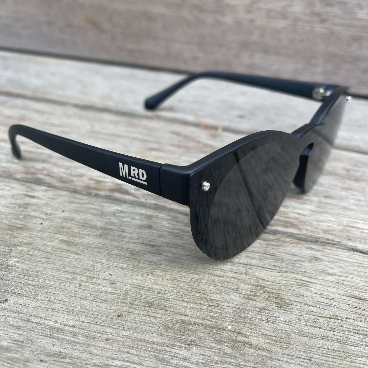 Womens sunglasses in Marilyn Monroe style with black frames.