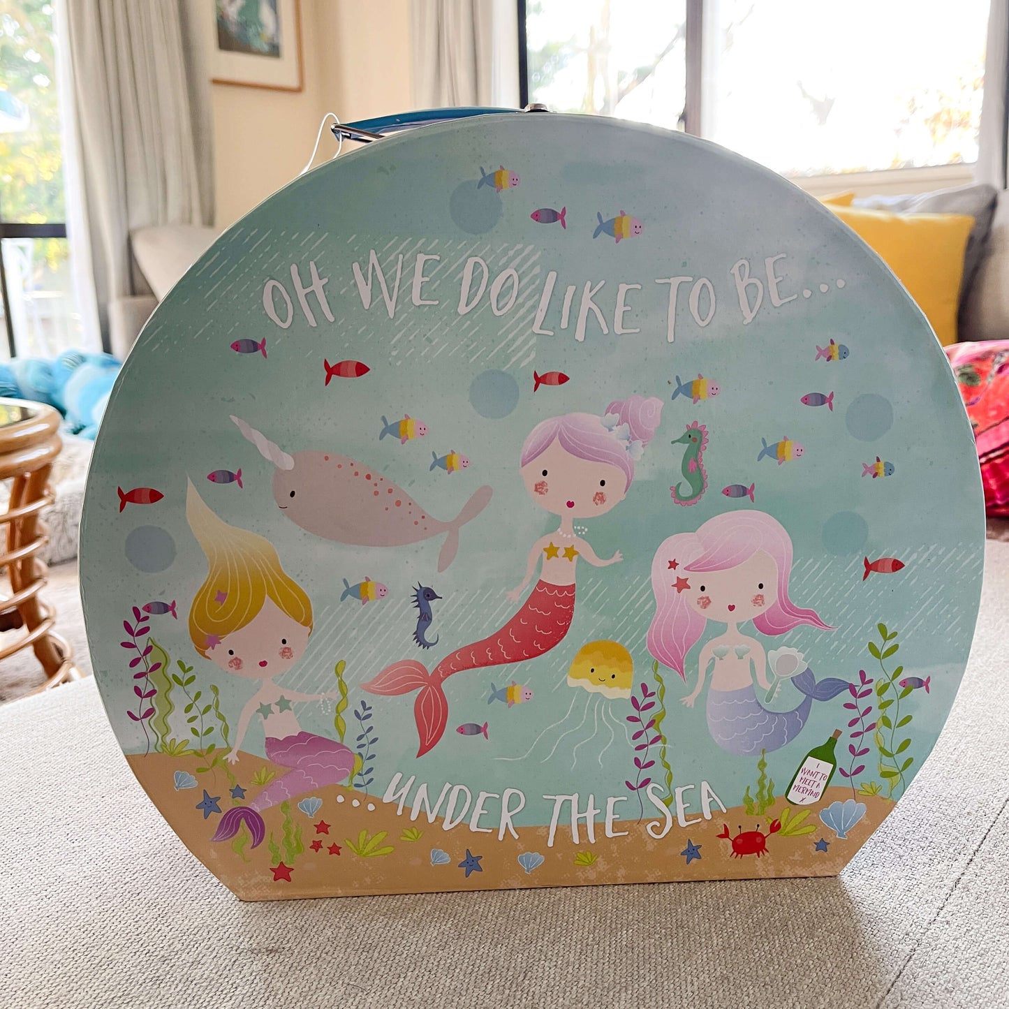 Childrens mermaid themed tin kitchen set in a round attache case.