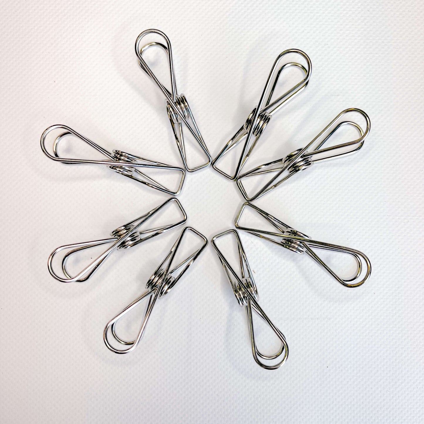 Stainless steel clothes pegs