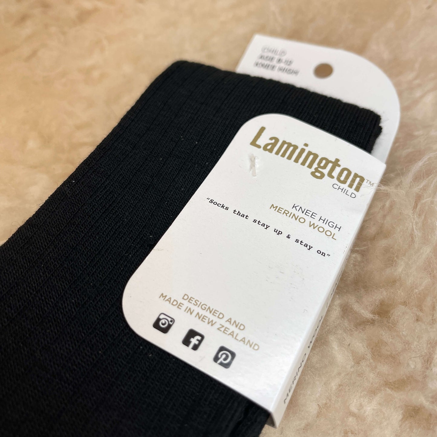 Knee high black merino socks.