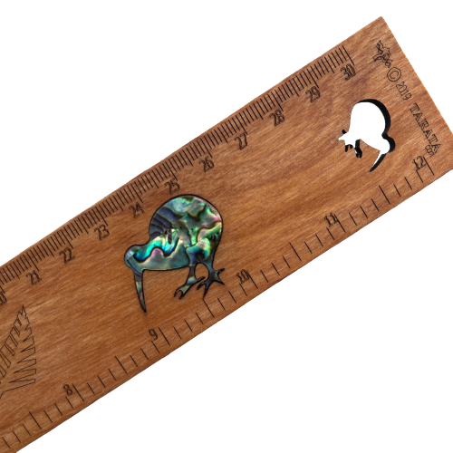 Wooden rimu ruler with paua shell Kiwi bird inlay.