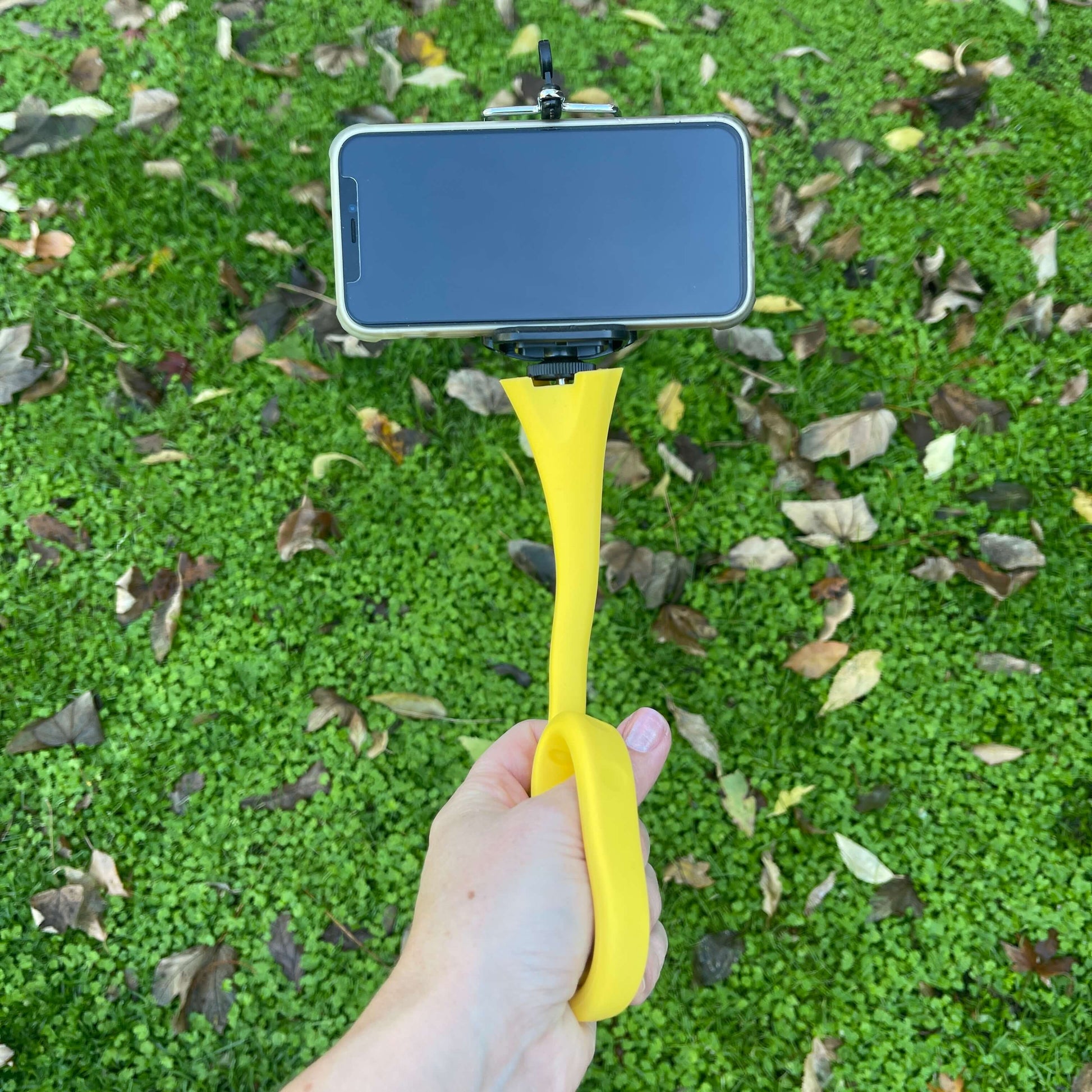 Bright yellow flexi selfie stick.