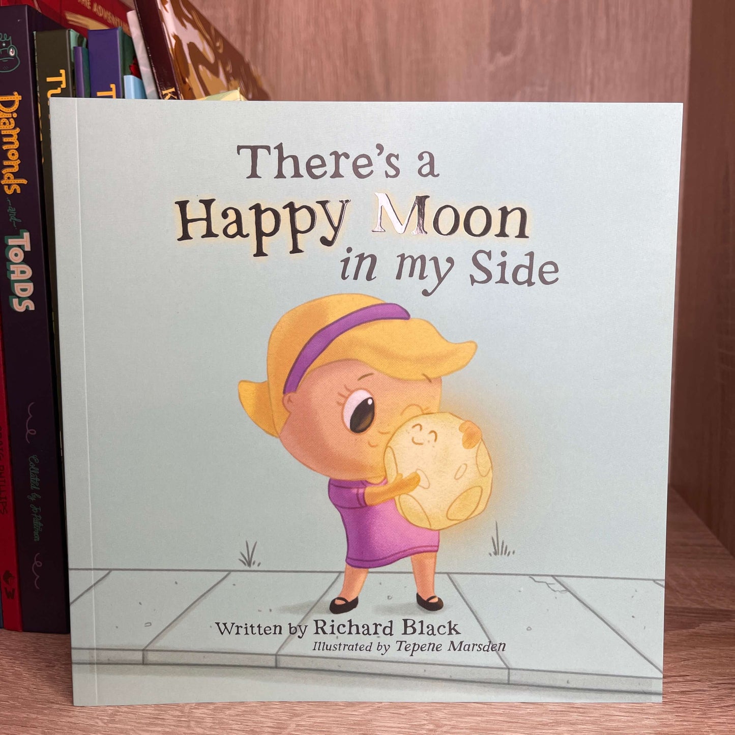 Childrens book There's a Happy Moon in my Side by Richard Black.