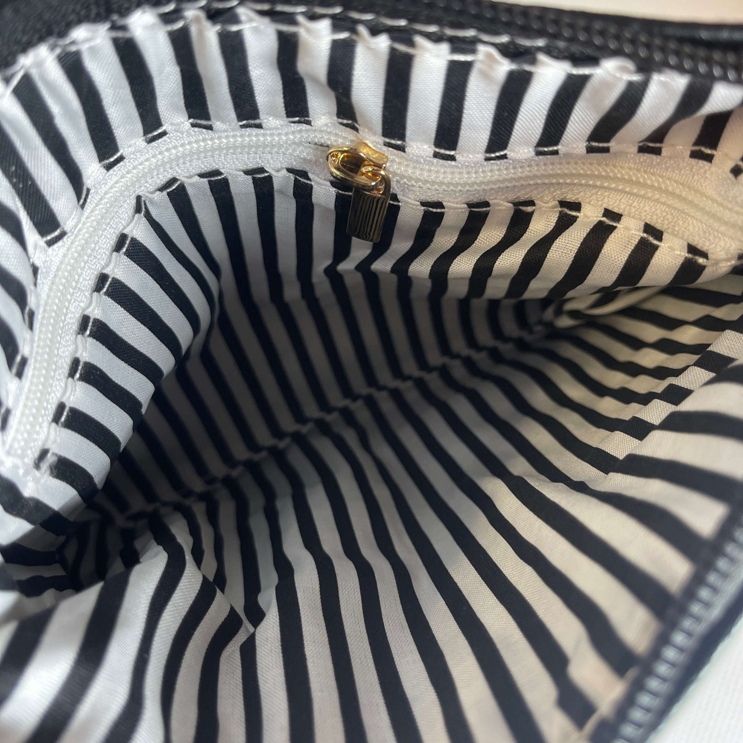 Inside lining of a bag.