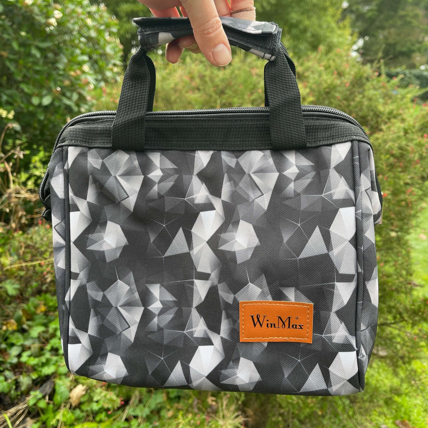 Winmax cooler bag in abstract monochrome print.